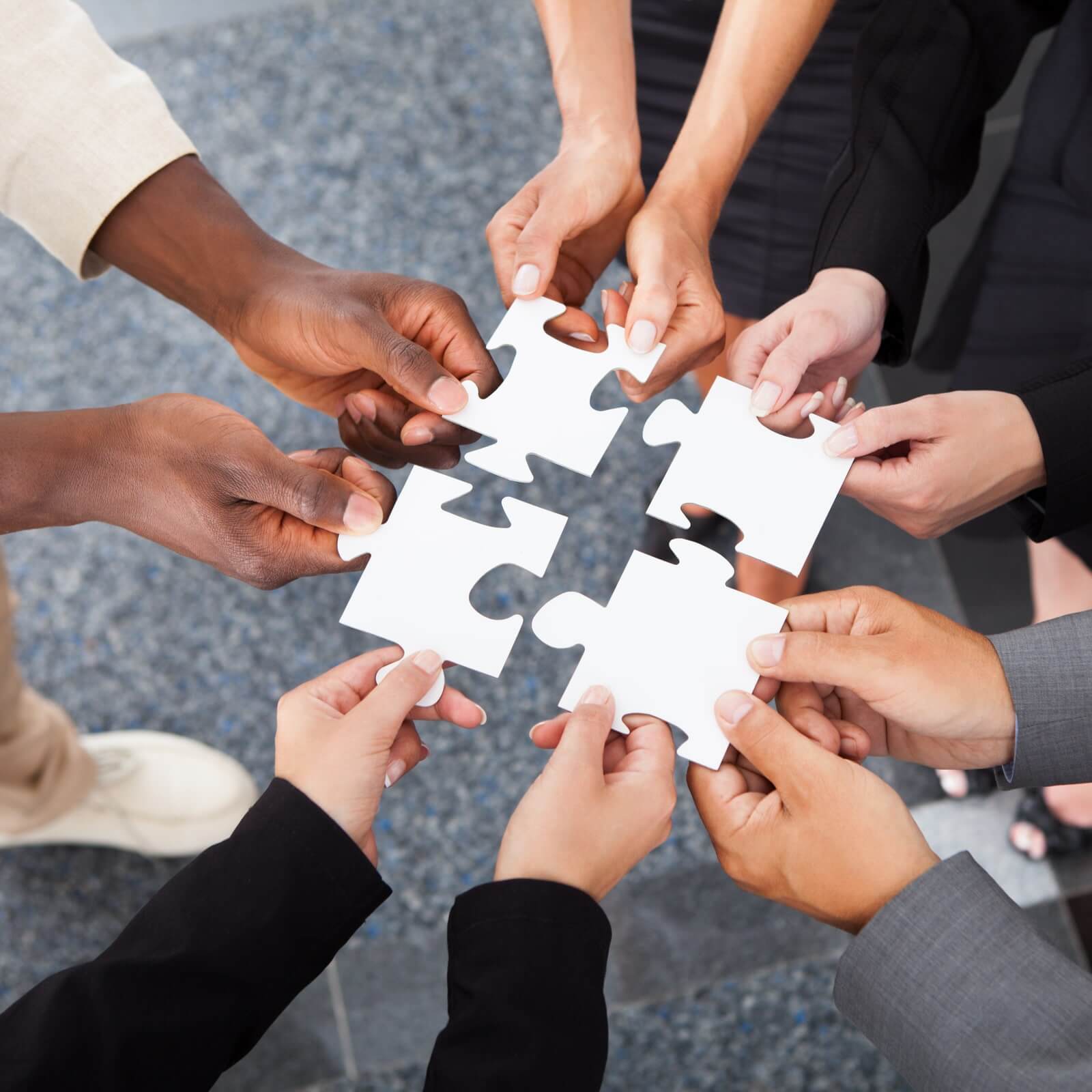 Coworkers at the same career working on a team building exercise